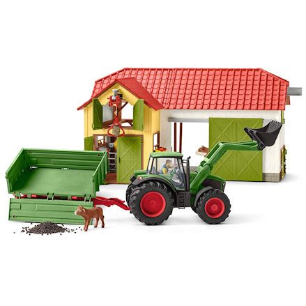 Schleich Tractor next to barn